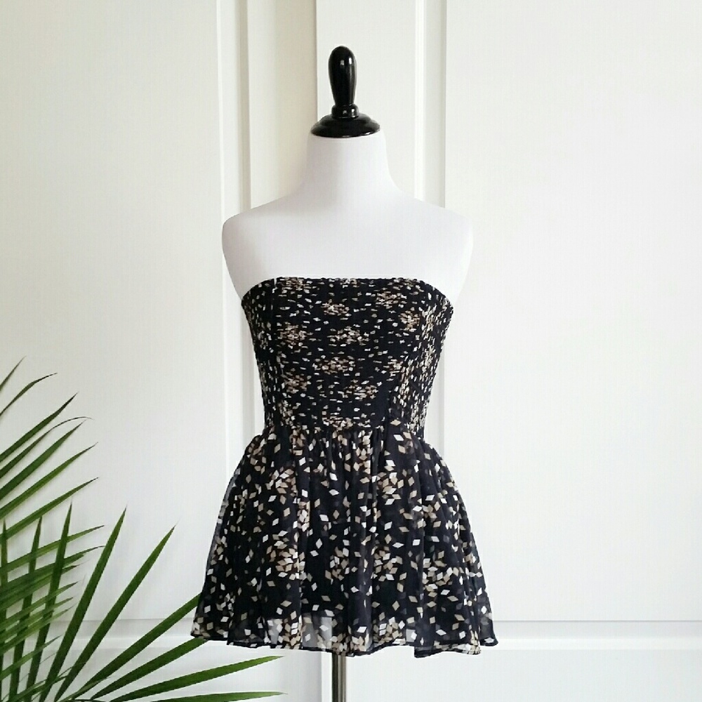 Smocked strapless peplum top